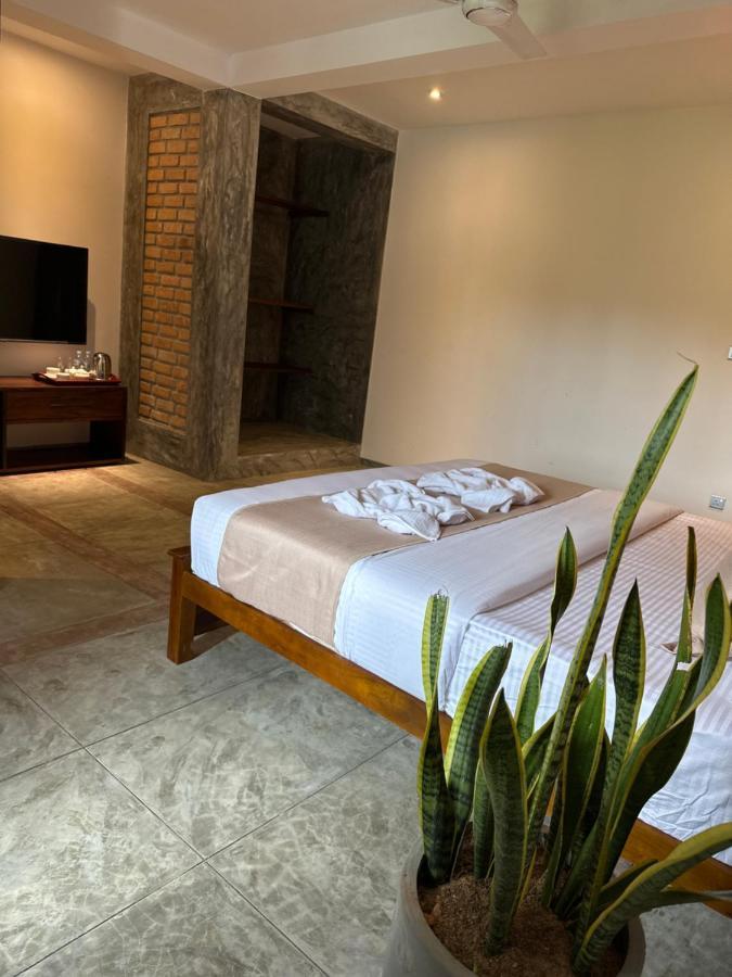 Hotel Ami Mirissa Extérieur photo