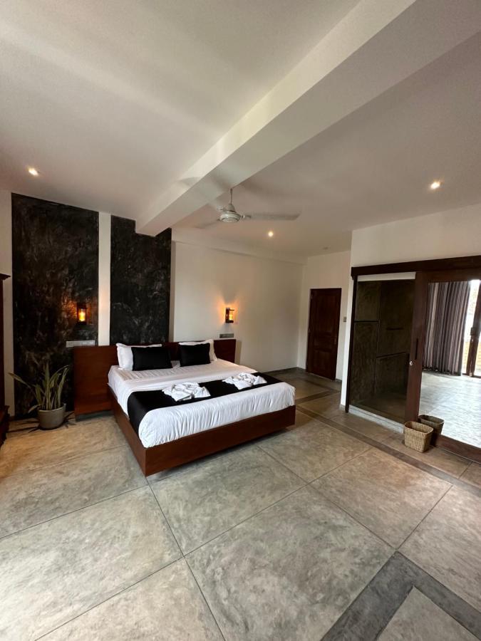 Hotel Ami Mirissa Extérieur photo