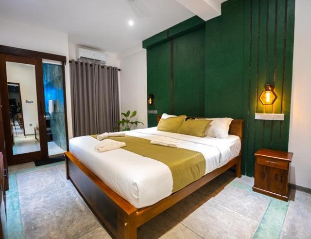Hotel Ami Mirissa Extérieur photo