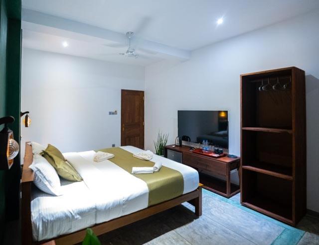 Hotel Ami Mirissa Extérieur photo